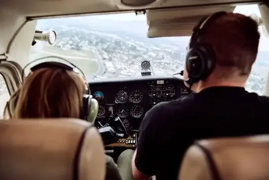 Cockpit view from a Cessna trainer during a Private Pilot training flight
