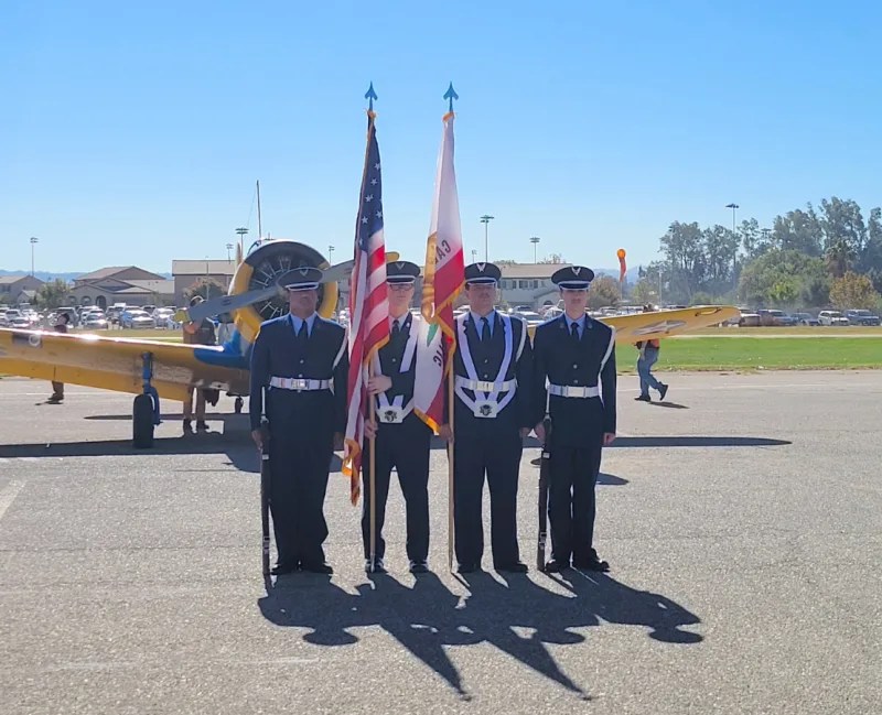 Civil Air Patrol color guard at a Veterans Day ceremony on the airport ramp
