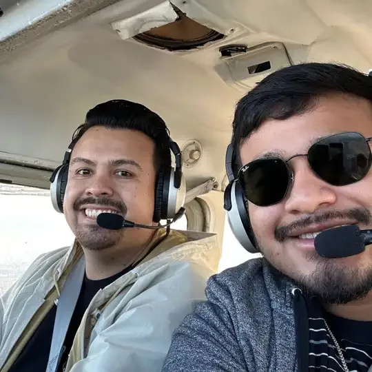Flight instructor candidate working with student pilot on the ramp at Redlands Municipal Airport