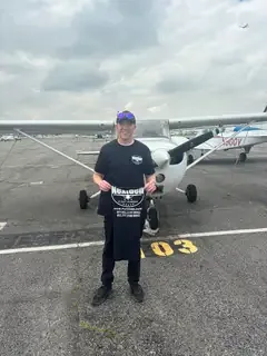Student pilot at the controls of a Cessna training aircraft during a career-track flight lesson